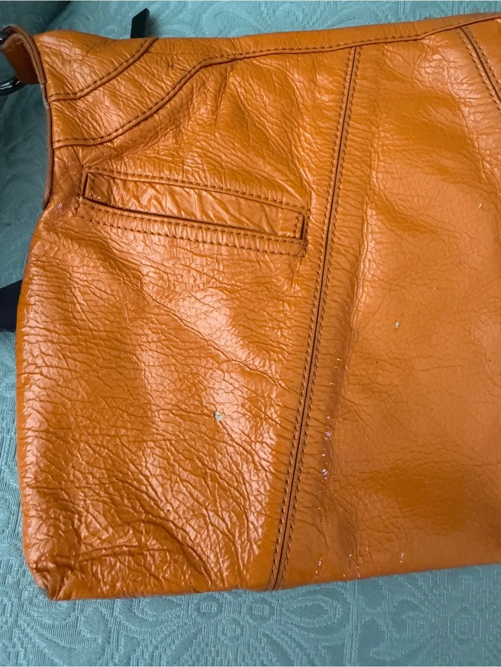 Bright orange HOBO bag